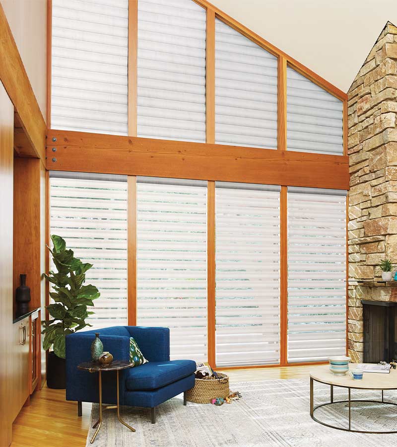 angled windows in living room covered in white window coverings nova scotia