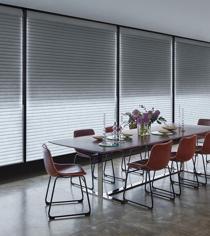 dining room with aura illuminated shades during day time