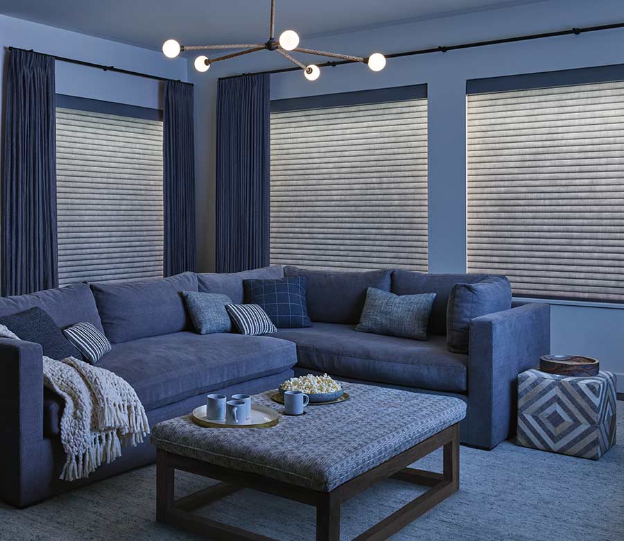 cellular window shades with aura illuminated in media room in Halifax NS