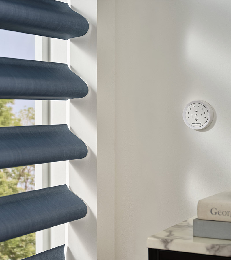 close up detail of automated window blinds and shades with device