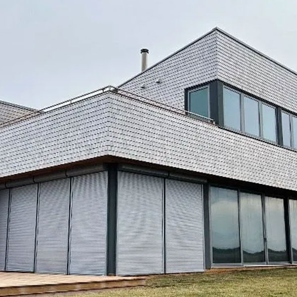 benefits-of-rolling-shutters-gotcha-covered-seeview outside view of rolling hurricane shutters on home