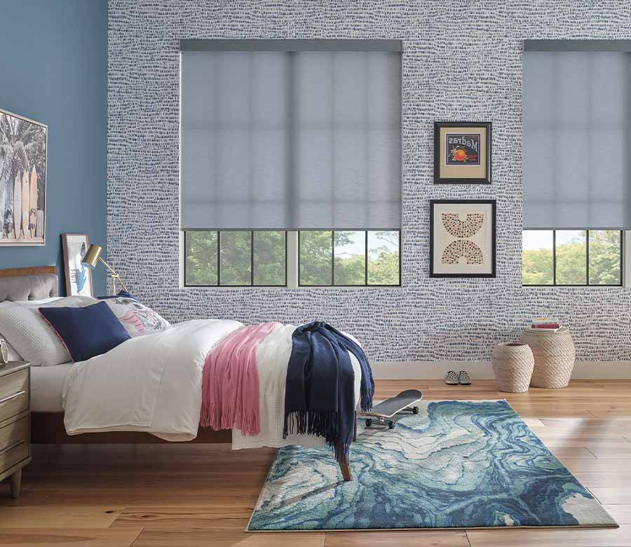 bedroom with blue roller window shades