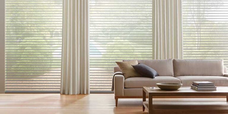 drapery paired with shades behind couch all neutral vibe