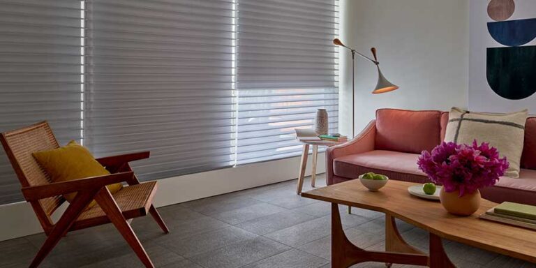 dual sheer shades in white floor to ceiling in living room