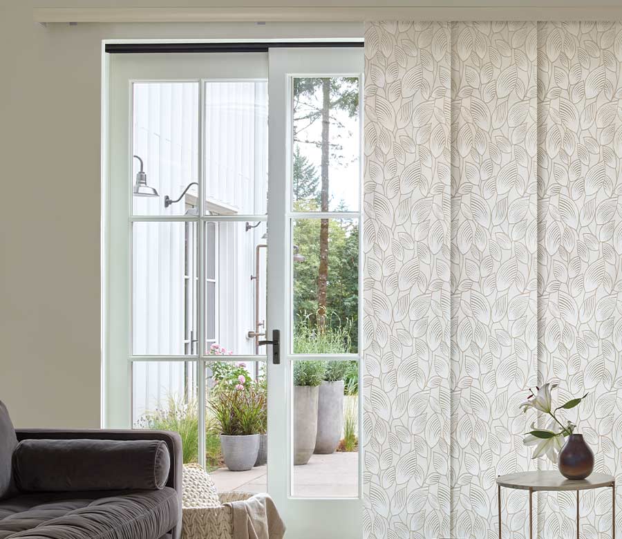 leaf patterned fabric window panels on sliding glass doors from living room in nova scotia