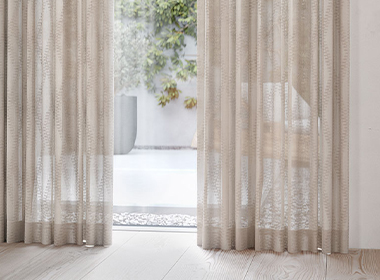 gold hunter douglas drapery onto deck