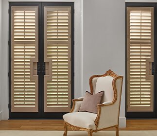 real wood shutters with black trim on large french doors traditional style