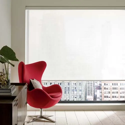 large-windows-designer-screen white screen shade infront of large window with red chair