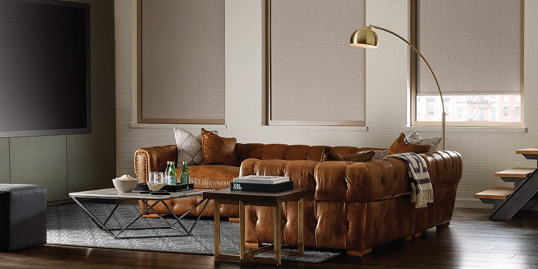living room with neutral motorized roller shades