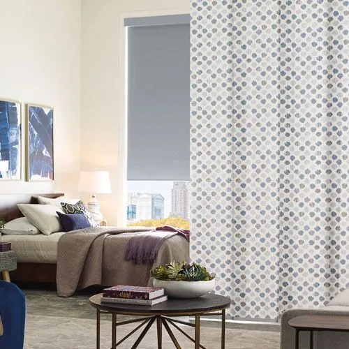 options-hunter-douglas-seeview-blinds blue and gray patterned drapery with blue screen shades in bedroom