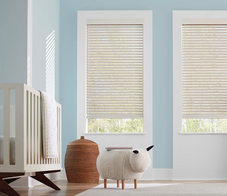 nursery with white faux wood blinds with childsafe solutions in nova scotia