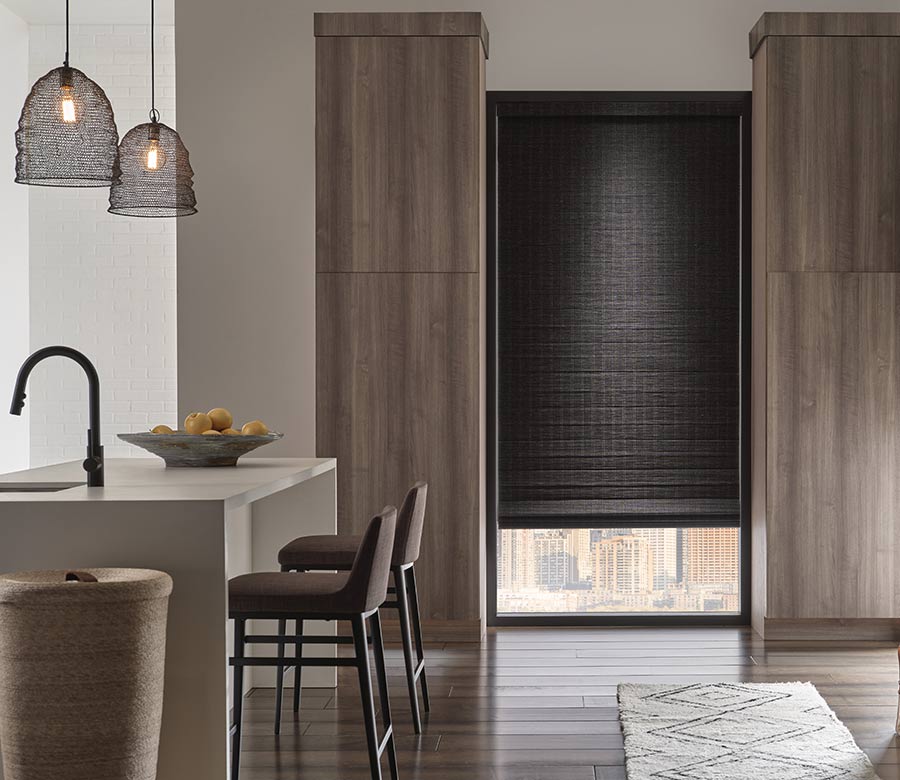 black woven wood window shade in kitchen