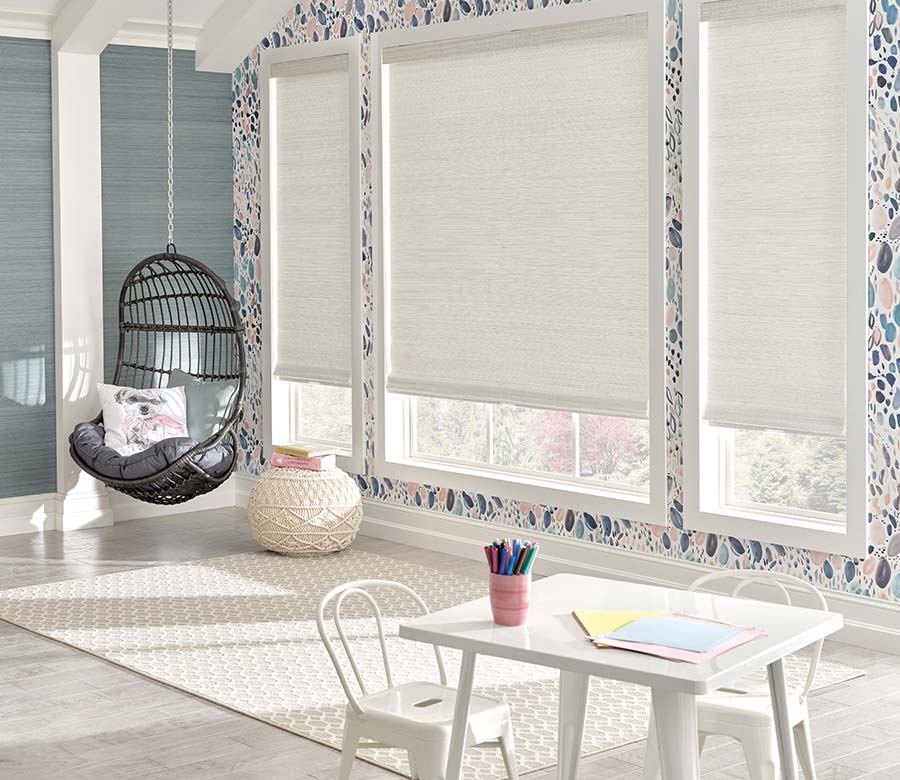 white woven wood shades in children play room child safe option