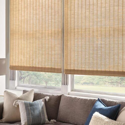 provenance-woven-wood-shades-textured-sustainable-fabric-shades-for-modern-living-room-hunter-douglas-gotcha-covered-seeview-nova-scotia light brown woven wood shades in living room
