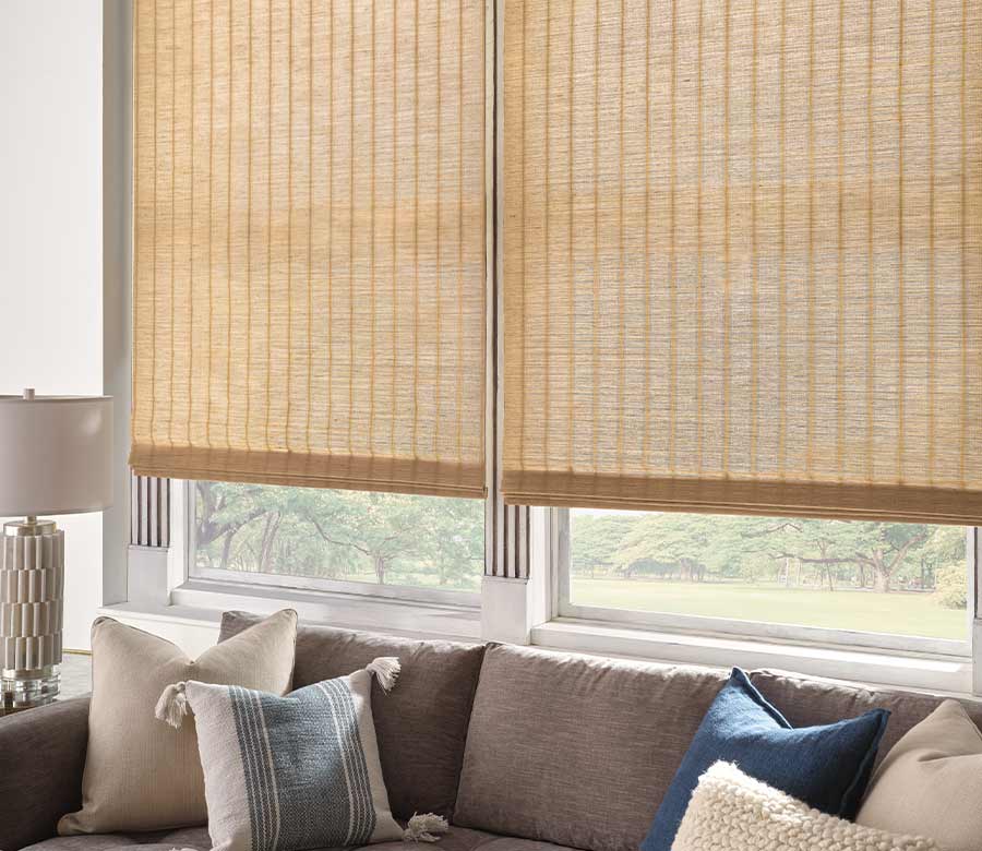light brown woven wood shades in living room