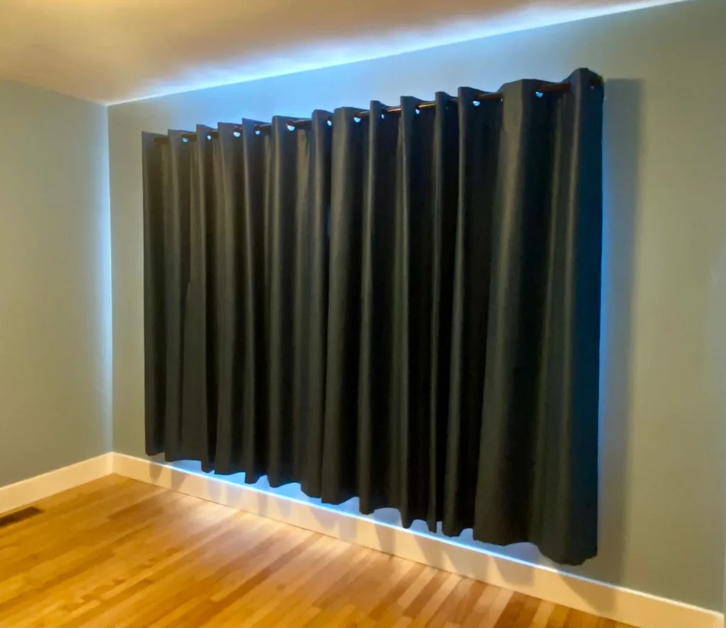 green drapery on window in bedroom