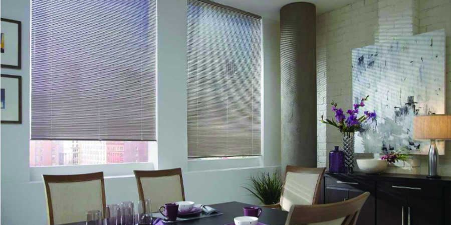 dining room with horizontal blinds in dining room