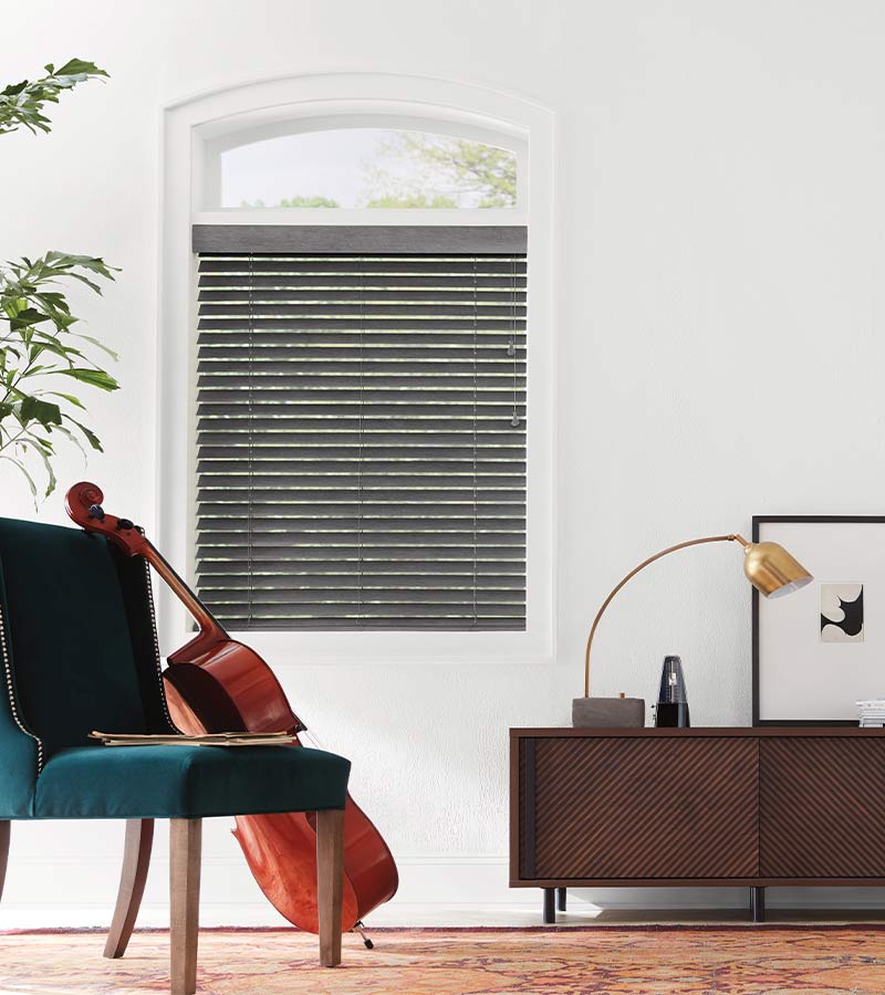 living room with window blinds in gray