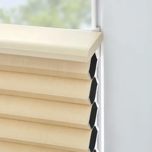 detail of creame colored window shade