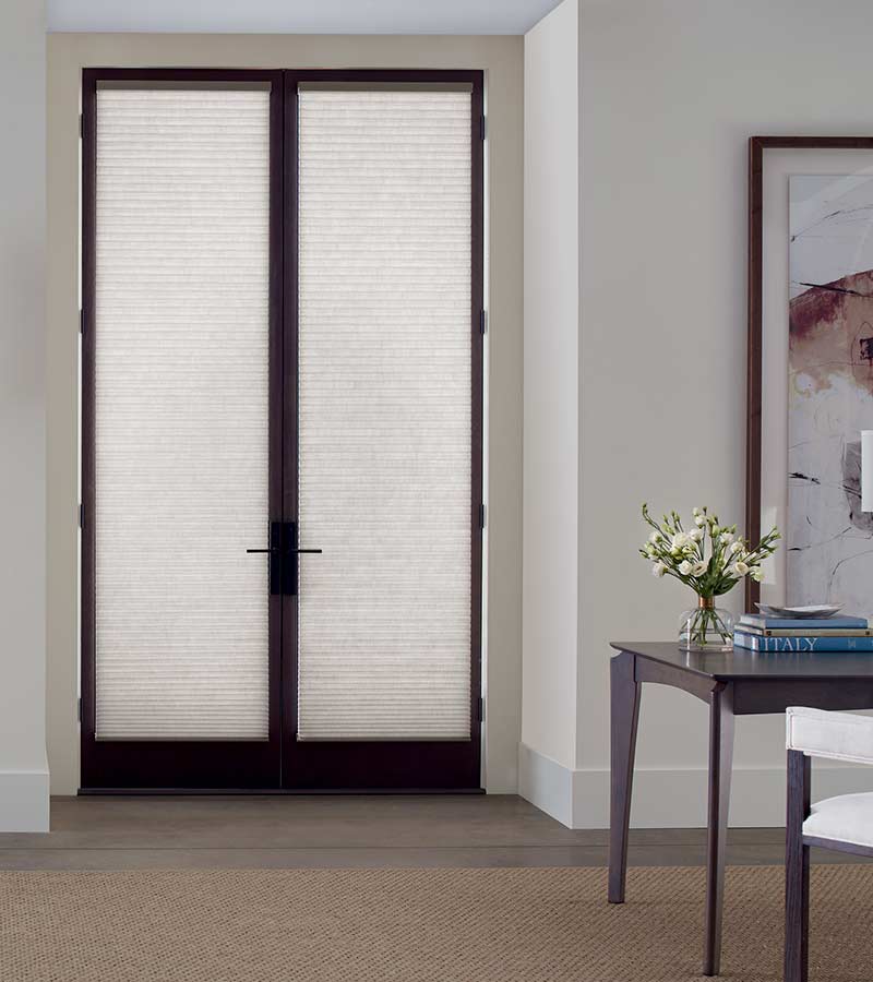 trackglide-window-treatments-hunter-douglas-glass-french-doors-with-shades-gotcha-covered-seeview-nova-scotia glass french doors with with honeycomb window shades with black door trim