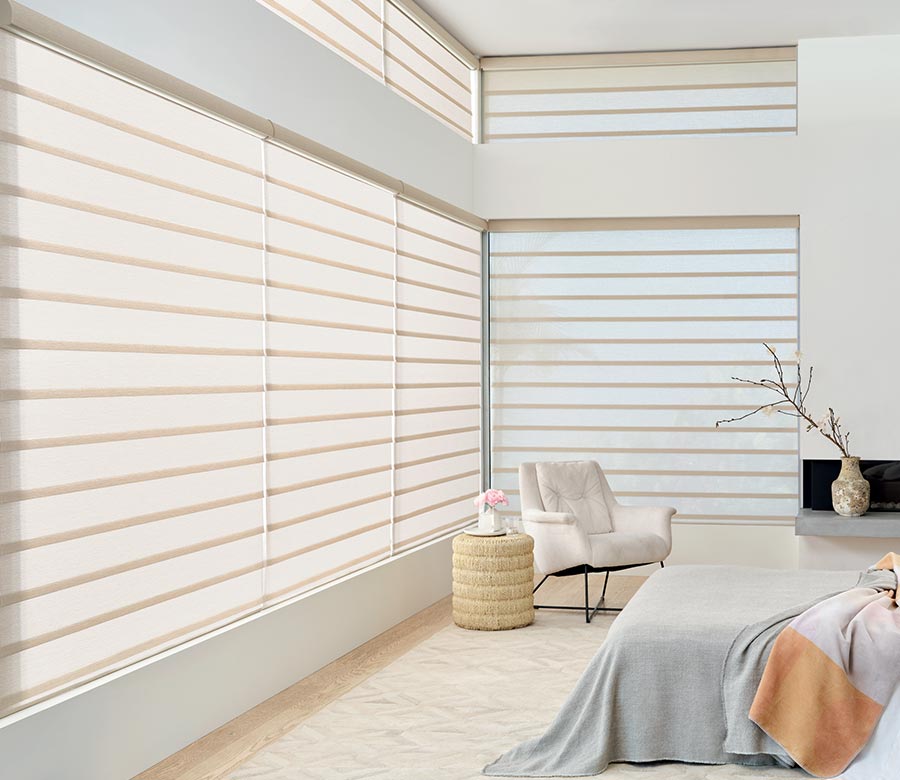 vignette-roman-shades-large-wiindow-coverings-in-bedroom-by-hunter-douglas-gotcha-covered-seeview-nova-scotia bedroom with floor to ceiling white vignette roman shades
