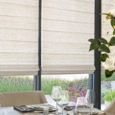 woven-textures-roman-hunter-douglas-gotcha-covered-seeview-blinds woven textured roman shades seeview in dining room with black trimmed window