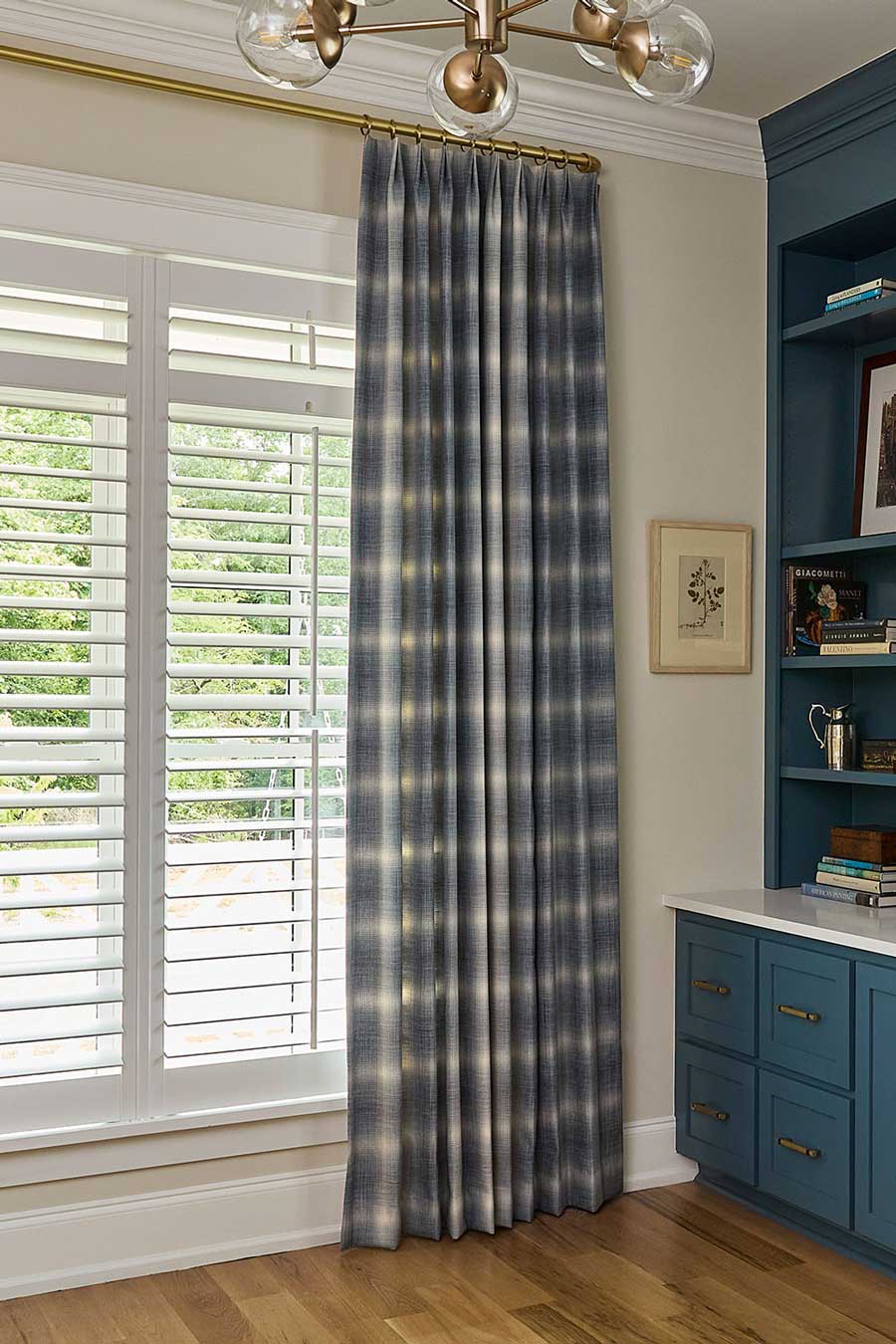 blue plaid window drapery in bedroom