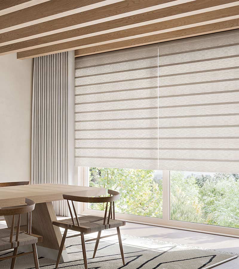 floor to ceiling energy efficient cream window coverings in dining room
