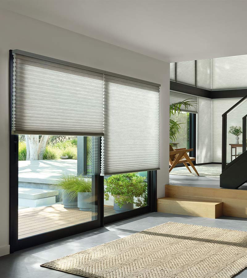 honeycomb window shades in white along hallway gotcha covered seeview