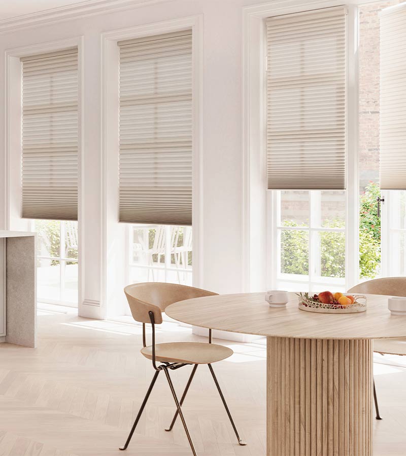 tilt-and-turn-dining-room-european-window-treatments-gotcha-covered-seeview-nova-scotia dining area with tilt and turn window coverings on door doors