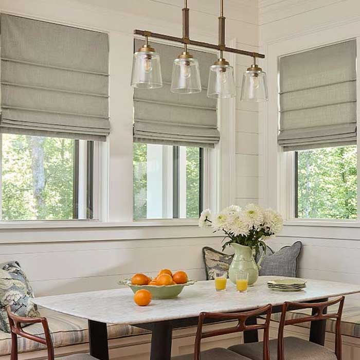 custom roman shades with fabric folds for privacy in kitchen breakfast nook