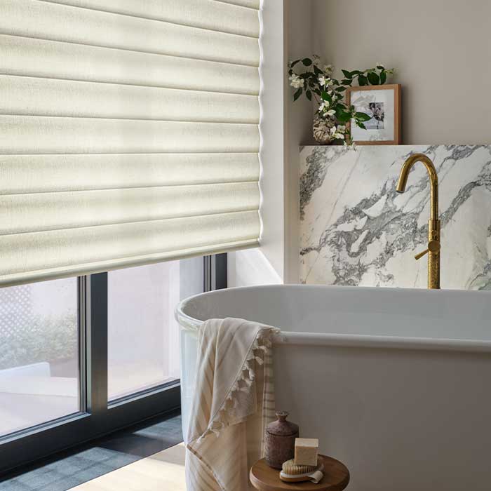 Pirouette® Shades on large sliding door in bathroom for privacy and reduced glare