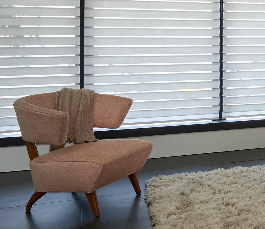 Custom Silhouette shades by Hunter Douglas, showcasing sheer fabric design in a modern interior